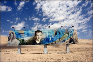 Roadside_mural_of_Bashar_al_Assad_along_the_Damascus-Aleppo_highway